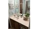 Well-lit bathroom with a vanity featuring a modern sink, vanity and ample counter space at 814 James Landing Ct., Murrells Inlet, SC 29576