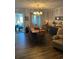A charming dining room featuring hardwood floors and a rustic chandelier at 814 James Landing Ct., Murrells Inlet, SC 29576