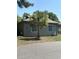 Charming single-story home with a well-maintained lawn and mature palm tree at 814 James Landing Ct., Murrells Inlet, SC 29576