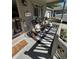 Cozy front porch with rocking chairs, fall decorations, and a welcoming atmosphere at 814 James Landing Ct., Murrells Inlet, SC 29576