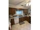 A compact kitchen with updated counters and white appliances and cabinets at 814 James Landing Ct., Murrells Inlet, SC 29576