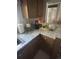 This is a kitchen with stained wood cabinets and white and light countertops at 814 James Landing Ct., Murrells Inlet, SC 29576