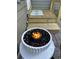 Cozy outdoor space featuring a modern fire bowl and a welcoming entryway at 814 James Landing Ct., Murrells Inlet, SC 29576