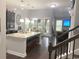 Bright open-plan kitchen with a central island, stainless appliances, and access to a covered back porch at 821 Falkirk St., Myrtle Beach, SC 29579