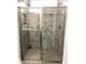Updated bathroom featuring a modern glass-enclosed shower with gray tiled walls and flooring at 821 Falkirk St., Myrtle Beach, SC 29579