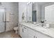 Bathroom featuring white cabinets, granite countertops, a shower, and a toilet at 824 Castleford Circle # 7C, Myrtle Beach, SC 29572