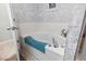 Bright bathroom featuring a relaxing soaking tub with a blue towel at 824 Castleford Circle # 7C, Myrtle Beach, SC 29572