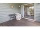 Outdoor deck with a covered chair and table at 824 Castleford Circle # 7C, Myrtle Beach, SC 29572