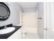 Bathroom featuring a sink, mirror, toilet and shower with neutral color tones at 890 Holly Sands Blvd., Little River, SC 29566