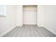 Walk-in closet with modern gray flooring and ample storage space for all your clothes at 890 Holly Sands Blvd., Little River, SC 29566