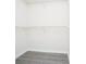Empty walk-in closet with flooring and shelving at 890 Holly Sands Blvd., Little River, SC 29566