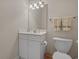 Bathroom featuring a white vanity and toilet at 907 Tidewater Dr., North Myrtle Beach, SC 29582