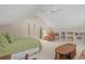Upstairs bedroom with carpet, vaulted ceiling, and a bonus area with shelving at 907 Tidewater Dr., North Myrtle Beach, SC 29582