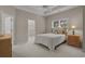 Bedroom with neutral carpet, a ceiling fan, and a walk-in closet at 907 Tidewater Dr., North Myrtle Beach, SC 29582