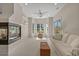 Comfortable living room with a modern fireplace and lots of natural light from the bay windows at 907 Tidewater Dr., North Myrtle Beach, SC 29582
