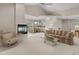 Cozy living room with an open floor plan and fireplace with view of the dining area at 907 Tidewater Dr., North Myrtle Beach, SC 29582