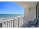 Balcony with ocean view and seating, ideal for relaxation and enjoying the coastal atmosphere at 9400 Shore Dr. # 716, Myrtle Beach, SC 29572