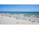 Wide sandy beach with ocean views, beach umbrellas, and plenty of space for relaxation at 9400 Shore Dr. # 716, Myrtle Beach, SC 29572