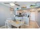 Cozy dining area with coastal decor overlooks the kitchen area at 9400 Shore Dr. # 716, Myrtle Beach, SC 29572
