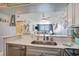 Kitchen bar overlooking the living area and ocean views at 9400 Shore Dr. # 716, Myrtle Beach, SC 29572