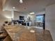 Modern kitchen with granite countertops, stainless steel appliances, and breakfast bar at 9840 Queensway Blvd. # 331, Myrtle Beach, SC 29572