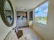 Well-lit laundry area with washer, dryer, and scenic lake view from a large window at 9840 Queensway Blvd. # 331, Myrtle Beach, SC 29572