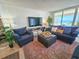 Modern living room with ocean views and cozy seating arrangements at 9840 Queensway Blvd. # 331, Myrtle Beach, SC 29572