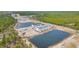 Aerial view of newly constructed neighborhood, complete with community ponds at Tbb Lineback Pl. # 32, Longs, SC 29568