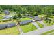 Spacious residences with lush lawns and mature trees provide a tranquil, desirable neighborhood setting at 1005 S Main St., Mullins, SC 29574