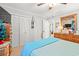The primary bedroom offers a dresser, closet, and neutral walls at 1005 S Main St., Mullins, SC 29574