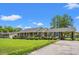 Charming brick home with a manicured lawn and established landscaping at 1005 S Main St., Mullins, SC 29574