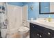 Well-maintained bathroom with a shower-tub combo, modern vanity, and marine-themed decor at 1011 S Ocean Blvd. # 301, North Myrtle Beach, SC 29582