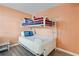 Cozy bedroom featuring a white metal bunk bed, perfect for or guests at 1011 S Ocean Blvd. # 301, North Myrtle Beach, SC 29582