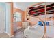 Kid-friendly bunk room with a playful theme, featuring comfortable bedding and a bright, inviting ambiance at 1011 S Ocean Blvd. # 301, North Myrtle Beach, SC 29582