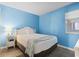 Serene bedroom with a comfy bed, soft lighting, and a minimalist aesthetic for a restful retreat at 1011 S Ocean Blvd. # 301, North Myrtle Beach, SC 29582