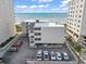 Elevated view showcasing an oceanfront condo building with ample parking at 1011 S Ocean Blvd. # 301, North Myrtle Beach, SC 29582