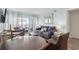 Cozy living room featuring an ocean view, comfortable seating, and charming nautical accents at 1011 S Ocean Blvd. # 301, North Myrtle Beach, SC 29582
