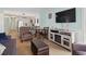 Inviting living area featuring an open floor plan with views of the kitchen at 1011 S Ocean Blvd. # 301, North Myrtle Beach, SC 29582
