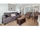 Comfortable living room with modern furniture, coastal decor, and a seamless flow to the kitchen at 1011 S Ocean Blvd. # 301, North Myrtle Beach, SC 29582