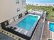 Aerial view of a community pool area with loungers and easy beach access at 1011 S Ocean Blvd. # 301, North Myrtle Beach, SC 29582