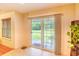 The dining area features a sliding glass door with window treatments to the backyard at 1025 Penny Ln. # 1025, Myrtle Beach, SC 29577