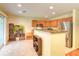 This kitchen has stainless steel appliances, light wood cabinets, and an adjacent dining area at 1025 Penny Ln. # 1025, Myrtle Beach, SC 29577