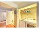 Laundry room featuring a washer, a dryer, storage shelves, and access to a bathroom at 1025 Penny Ln. # 1025, Myrtle Beach, SC 29577