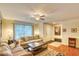 Welcoming living room featuring a ceiling fan, neutral tones, and stylish furnishings at 1025 Penny Ln. # 1025, Myrtle Beach, SC 29577