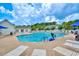 This is an aerial view of the outdoor community pool with lounge chairs at 1025 Penny Ln. # 1025, Myrtle Beach, SC 29577