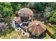 Bird's eye view of a one-of-a-kind geodesic home with surrounding patio and lush greenery at 10381 Hardwick Rd., Nichols, SC 29581