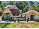 Unique dome home exterior with inviting patio and lush greenery at 10381 Hardwick Rd., Nichols, SC 29581