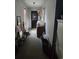 Hallway featuring cluttered storage, with front door and natural light at 10381 Hardwick Rd., Nichols, SC 29581