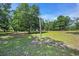 Sprawling grassy yard with mature trees offering plenty of shade and space at 10381 Hardwick Rd., Nichols, SC 29581