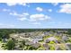 Aerial view of a home in a cozy community with sidewalks and a tranquil pond nearby at 1128 Sennema Circle, Myrtle Beach, SC 29588